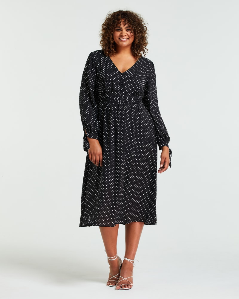 Front of a model wearing a size 1X Georgiana Spot Dress in Black/Milk by Estelle. | dia_product_style_image_id:234916